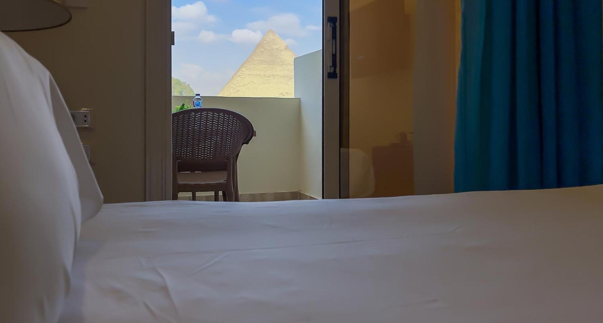 Pyramids Glory Inn Kafrat al Jabal Bagian luar foto